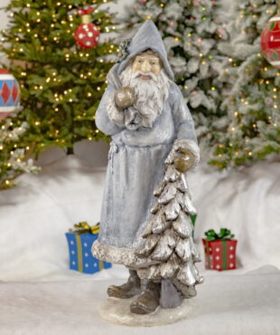 Full View of Santa Clause with Blue Cloak Holding a Sack of Gifts and a Christmas Tree