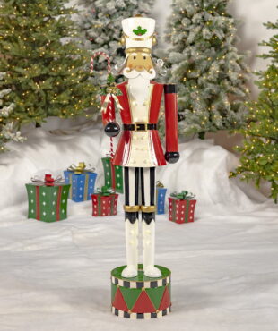65 inch tall freestanding iron Nutcracker soldier in red with candy cane and LED Lights